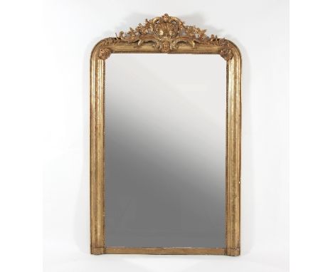 A plaster gilt overmantel mirror with shell and scroll cresting and a beaded moulded frame, 145cm x 90cm Condition Report: Th