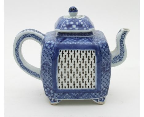 A Chinese blue and white square section teapot, Qianlong, with reticulated panels to the cover and sides within borders of di