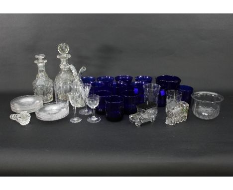 A quantity of assorted glassware and blue glasses, comprising two cut glass decanters, two finger bowls, three various stemme