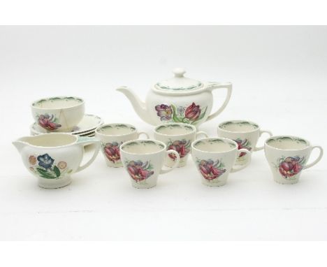 Susie Cooper: a fritillary pattern tea service, comprising teapot and cover, six cups and six saucers, a sugar bowl and a mat