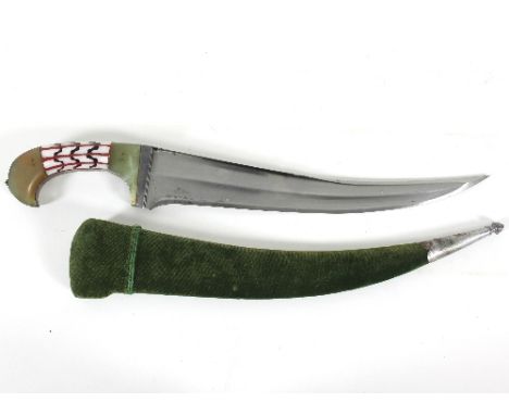 An Indian Khanjar dagger, the jade handle with mother-of-pearl and enamel inlaid panels, fullered blade with armour piercing 