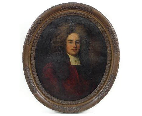 18th Century English School/Portrait of a Bewigged Gentleman/half length, wearing a white stock and red cape/oval/oil on canv
