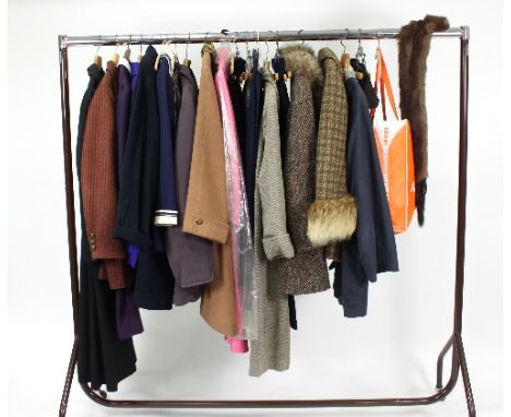 A quantity of 1970/80s garments and shoes to include an Aquascutum wool coat with fur collar, Aquascutum blue overcoat and sk