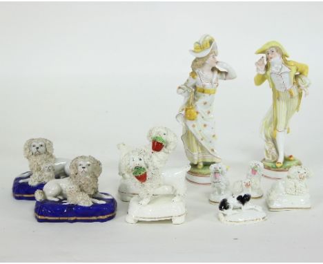A pair of French porcelain figures, lady and gallant each with printed green anchor mark beneath, 18cm high and a quantity of