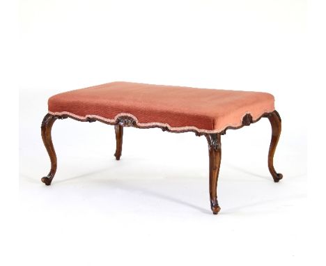 A late 19th Century walnut stool on cabriole legs with carved shell detailing Condition Report: The stool has no visible worm