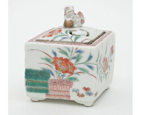 A late 17th Century Japanese Imari koro and cover of diamond shape, the pierced cover with dog of Fo finial and painted a chr