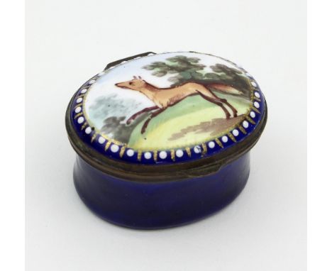A Bilston enamel oval patch box, late 18th Century, the hinged cover decorated a fox and enclosing a mirror, 4cm wide/see ill