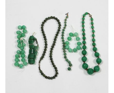 A quantity of jade necklaces, bracelets etc.