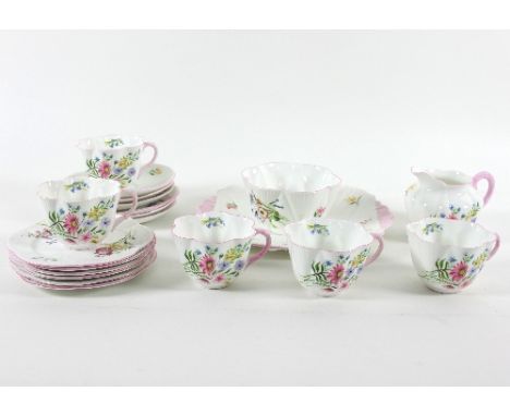 A Shelley 'Wild Flowers' tea set, comprising five cups, six saucers, six side plates, sugar bowl, milk jug and a large plate