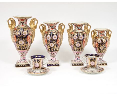 A garniture of four Derby baluster vases with swan handles and square bases, 29cm high and smaller and a pair of chocolate cu