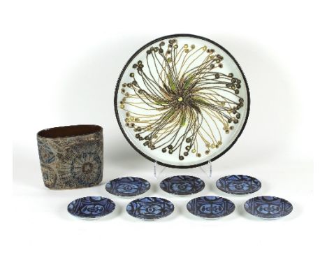 Royal Copenhagen: a faience ware circular dish, with stylised seed head to centre, numbered 635/3726, 25cm diameter, a Royal 