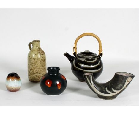 A studio pottery stoneware teapot with bamboo handle, impressed mark 'db', a stoneware flagon with impressed seal mark to bod