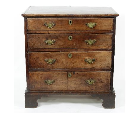 A George III elm chest of four long drawers on bracket feet, 80cm wide/see illustration Condition Report: Stains and pitting 