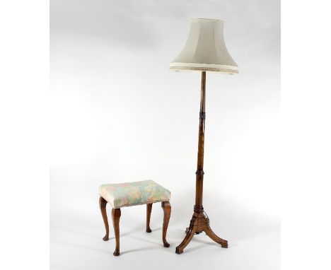 A walnut standard lamp on turned column with triform base and a mahogany framed stool