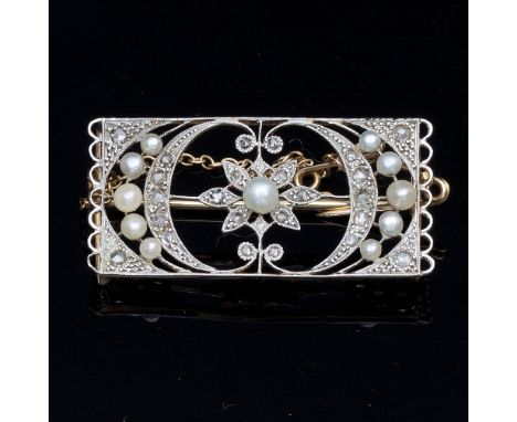 A pearl and diamond rectangular panel brooch, early 20th Century, of openwork form, 32mm x 15mm, approximately 4gm Condition 