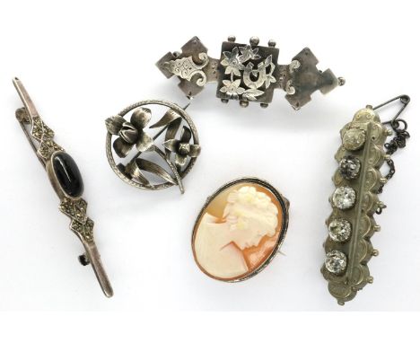 Five silver brooches including a hallmarked silver example, largest L: 62 mm. P&amp;P Group 1 (£14+VAT for the first lot and 