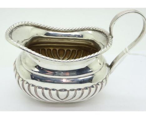 Hallmarked silver creamer, London assay, L: 12 cm, 132g, light use marks but no dents to silver. P&amp;P Group 1 (£14+VAT for