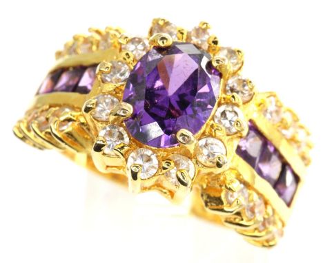 10ct gold flower ring set with amethyst and CZ stones, size P, 6.9g. P&amp;P Group 1 (£14+VAT for the first lot and £1+VAT fo