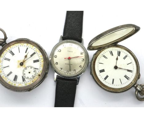 Two hallmarked silver ladies fob watches, one lacking glass, and a Timex ladies wristwatch, not working at lotting. P&amp;P G