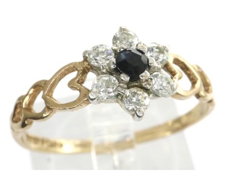 9ct gold flower ring set with sapphire and CZ stones and pierced heart shoulders, size R, 1.3g. P&amp;P Group 1 (£14+VAT for 