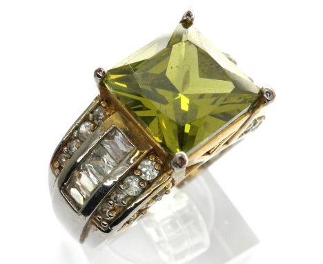 14ct white and yellow gold ring set with a princess cut emerald and CZ shoulders, size R, 9.2g. P&amp;P Group 1 (£14+VAT for 