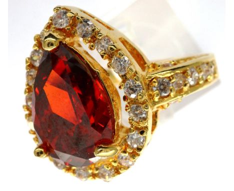 10ct gold ring set with a pear shaped garnet and CZ shoulders, size Q, 5.5g. P&amp;P Group 1 (£14+VAT for the first lot and £