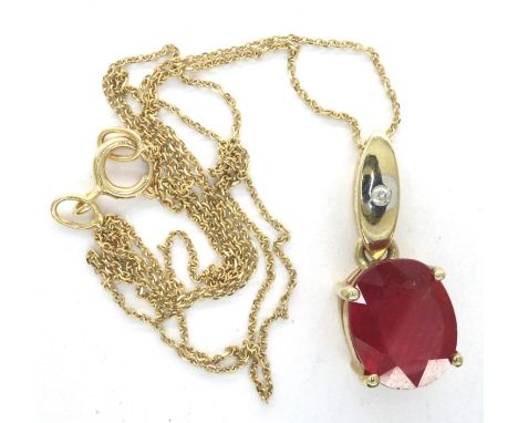 10ct gold ruby pendant on a 10ct gold chain, pendant H: 14 mm, chain L: 40 cm, 2.5g. P&amp;P Group 1 (£14+VAT for the first l