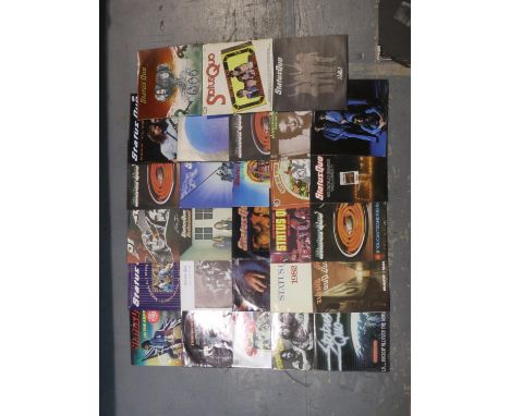 Twenty six Status Quo LPs and two 12 inch singles including The Army. Not available for in-house P&amp;P 
