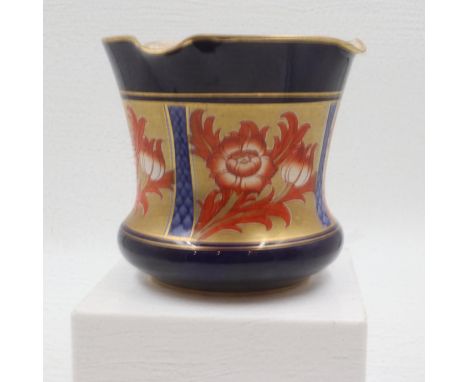 Macintyre cobalt blue planter, decorated with gilt floral panels, H: 17cm, some discolouration around rim. UK P&amp;P Group 2