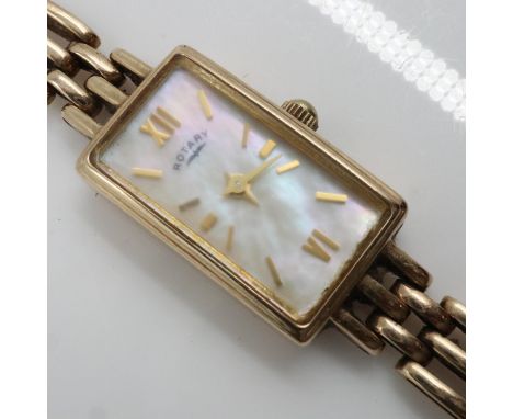ROTARY: ladies 9ct gold cased wristwatch on 9ct gold bracelet, mother of pearl dial, requires battery, 15.3g. UK P&amp;P Grou