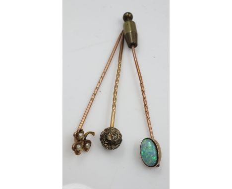 9ct gold clover leaf stick pin set with seed pearl with two further unmarked gold stick pins, one set with a large Australian