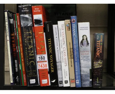 Shelf of Titanic related books and a tin poster. Not available for in-house P&amp;P 
