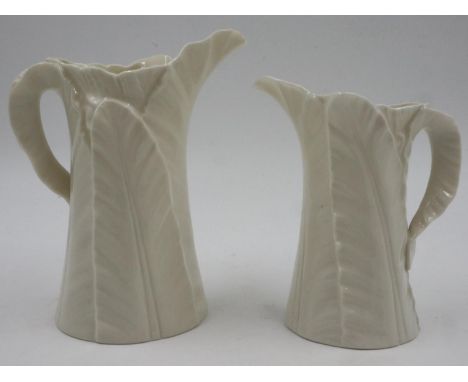 Two Royal Worcester White Leaf form jugs, no cracks or chips, largest H: 16 cm. UK P&amp;P Group 2 (£20+VAT for the first lot