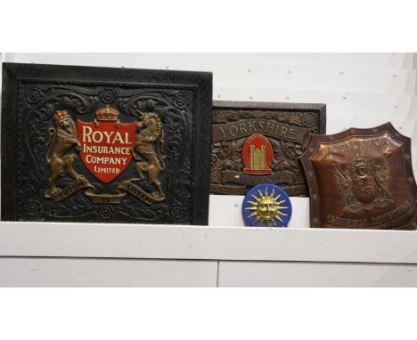 Four vintage insurance company signs, including Royal Insurance, Yorkshire Insurance, General Accident and a cast iron exampl