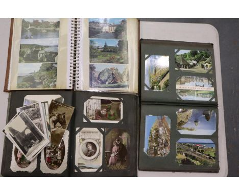Four albums of vintage and later postcards, approximately 500 in total. Not available for in-house P&amp;P