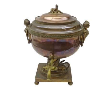 Victorian copper samovar of oval form with figural ring handles, Sphinx finial and stem, moulded borders and brass tap on rec