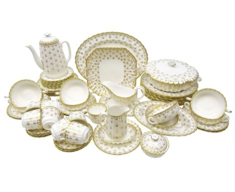 Spode 'Fleur De Lys' gold pattern dinner and coffee service comprising eight dinner plates, seven side plates, eight soup bow