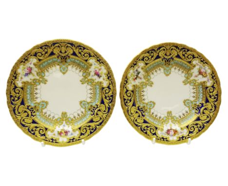 Pair Royal Crown Derby tea plates from the Judge Elbert Henry Gary service, circa 1909 and 1910, hand painted by Albert Grego