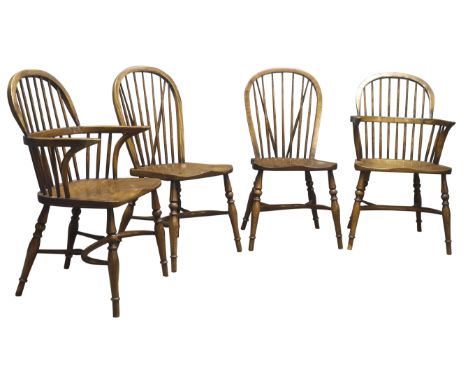 Set four 20th century elm Windsor chairs, two double back and two stick back chairs with crinoline stretchers Condition Repor