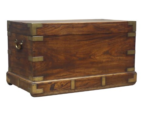 Victorian brass bound hardwood military style trunk, with hinged lid brass side carry handles and skirted base, W92cm, H53cm,