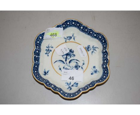 A Worcester porcelain shaped teapot stand with floral decoration, 14cm diameter