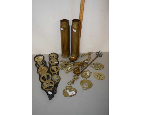 Collection of various horse brasses, pair of shell cases, toasting fork etc