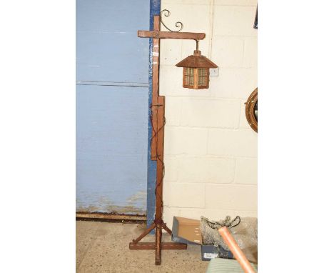 A vintage adjustable floor standing lantern light