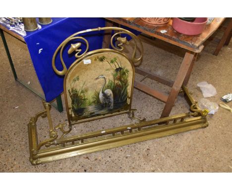 Victorian mirrored fire screen set in an Art Nouveau type brass frame together with an accompanying brass fire curb