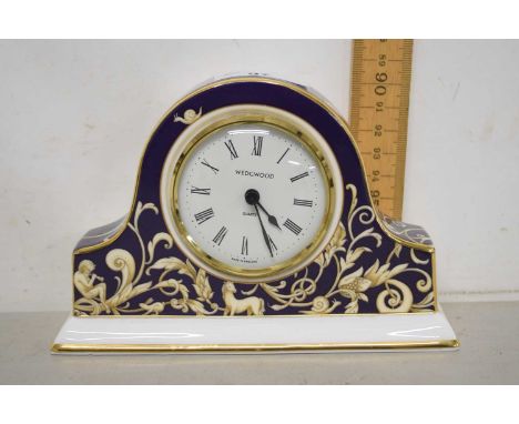 A Wedgwood porcelain cased mantel clock