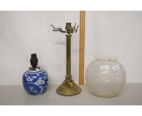 A brass based table lamp with frosted glass shade together with a further small table lamp formed from a prunus pattern ginge