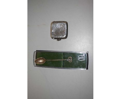 A hallmarked silver vester together with a further cased collectors spoon