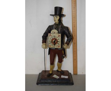 A novelty continental figural mantel clock on plinth base