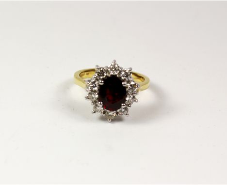 Oval Thai ruby and diamond cluster ring hallmarked 18ct (ruby approx 2 carat) Condition Report Click here for further images,