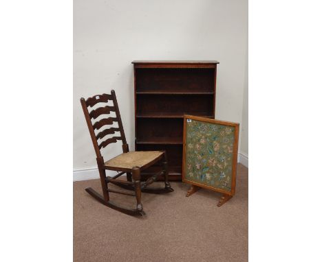 20th century oak ladder back rocking chair with rush seat, oak metamorphic firescreen/table with needlework panel and an oak 